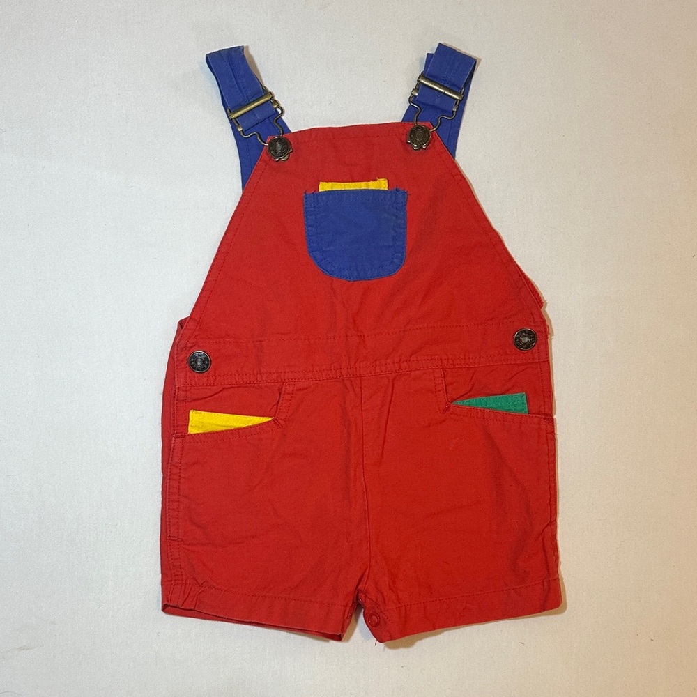 Vibrant Red Kids Overalls with Blue and Yellow Accents